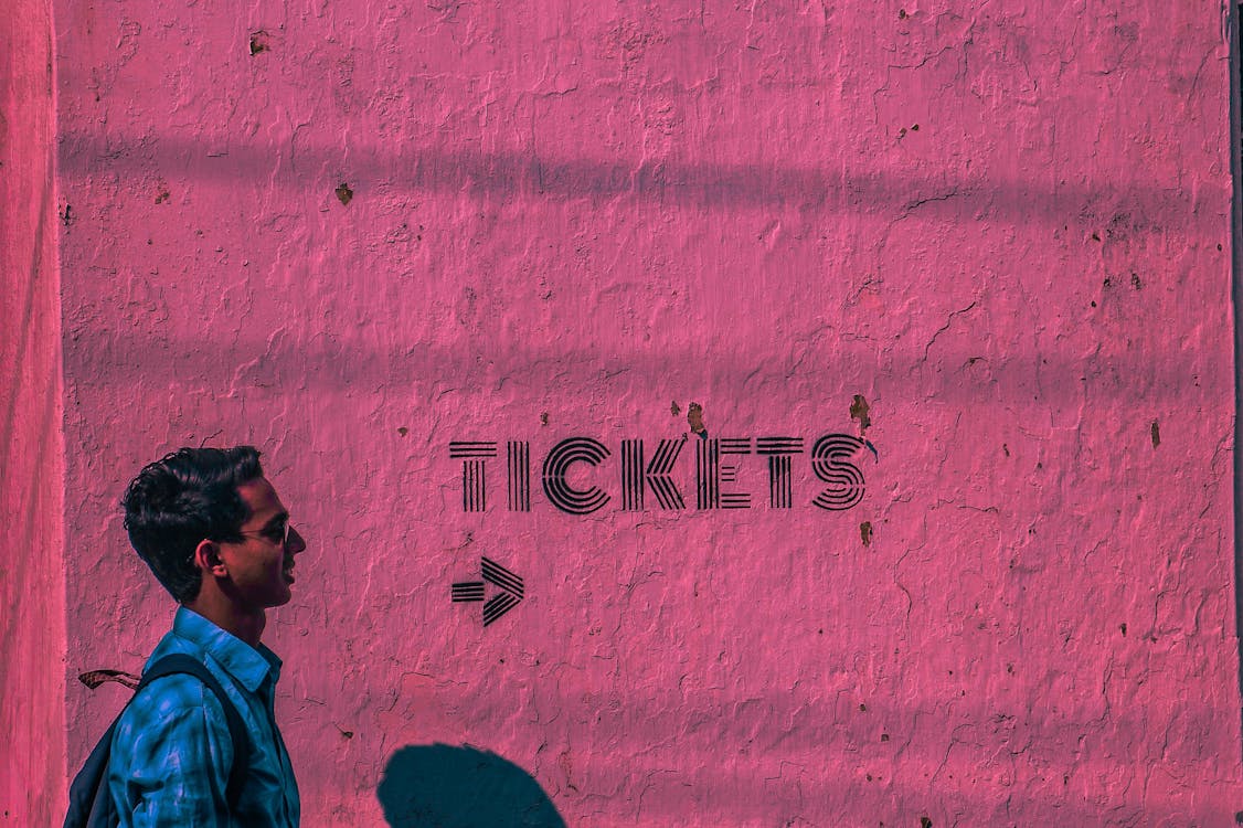 Photo by Akil Mansoor Kodakkadan from Pexels: Tickets