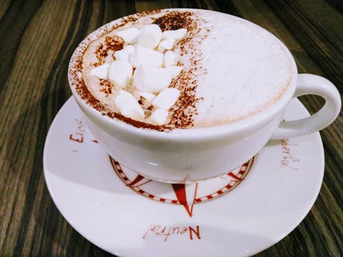 Photo of White and Brown Frappe on Ceramic Tea Cup