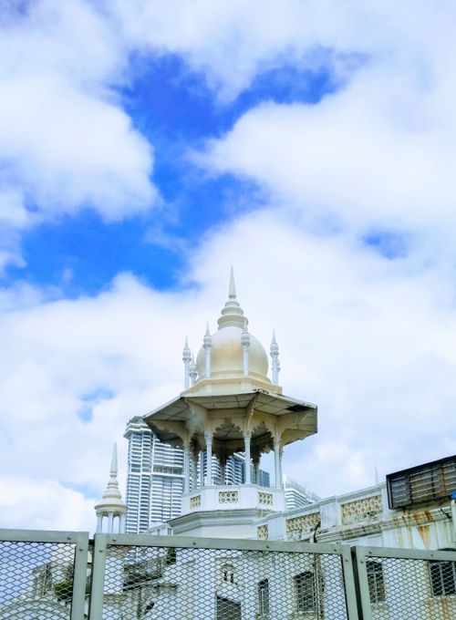 Free Elegant architectural dome with spires under a vibrant sky, showcasing cultural design. Stock Photo