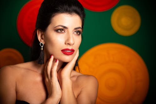 Headshot of a Woman Wearing Red Lipstick