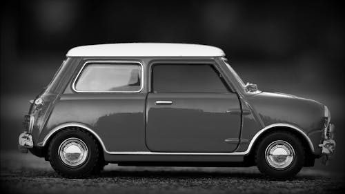 Monochrome Photo of a Toy Car