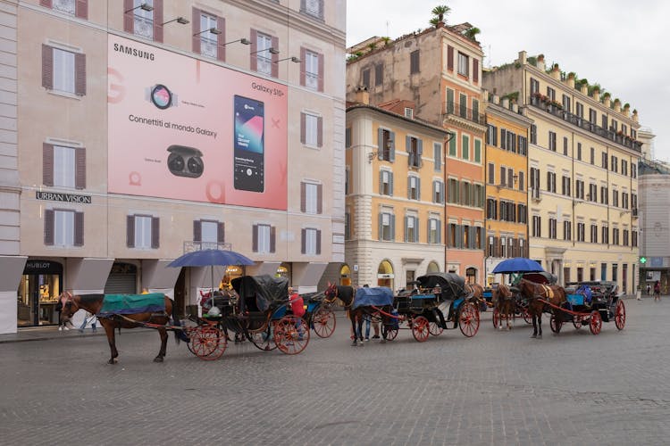 Photo Of Carriages Near Buildings