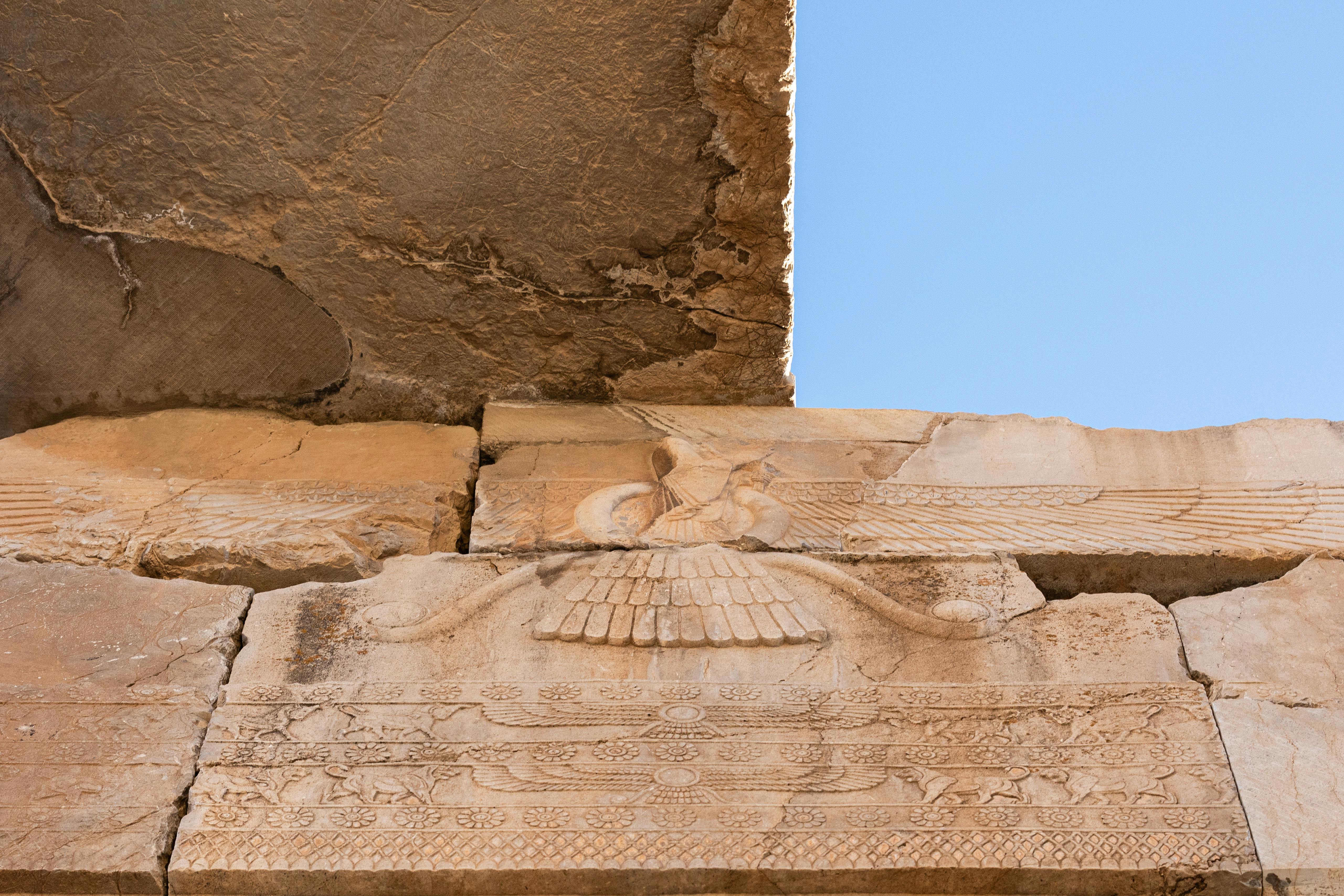 the damaged wall of the gate of all nations in persepolis iran