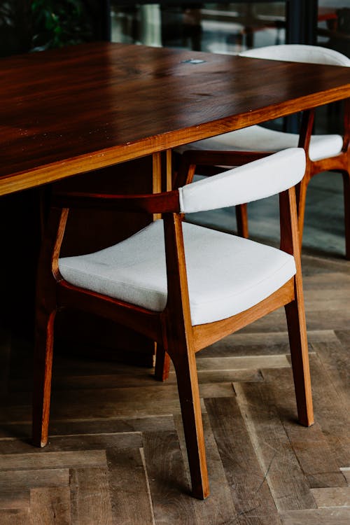 Free Brown Wooden Table and White and Brown Chair Stock Photo