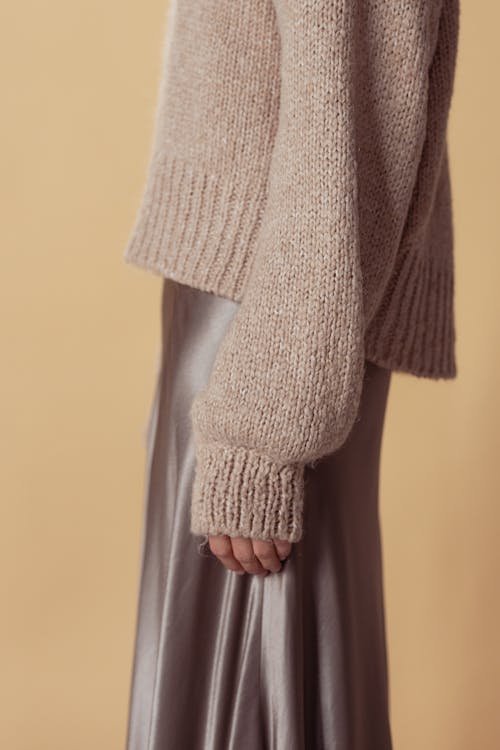 Side View of a Person in a Knitted Sweater