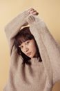 Woman in Gray Knit Sweater