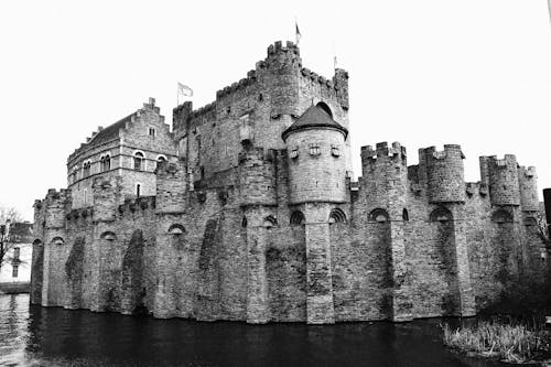 Grayscale Photo of Gravensteen Castle in Ghent, Belgium
