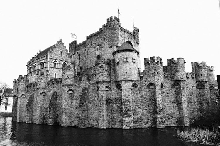 Grayscale Photo Of Gravensteen Castle In Ghent, Belgium