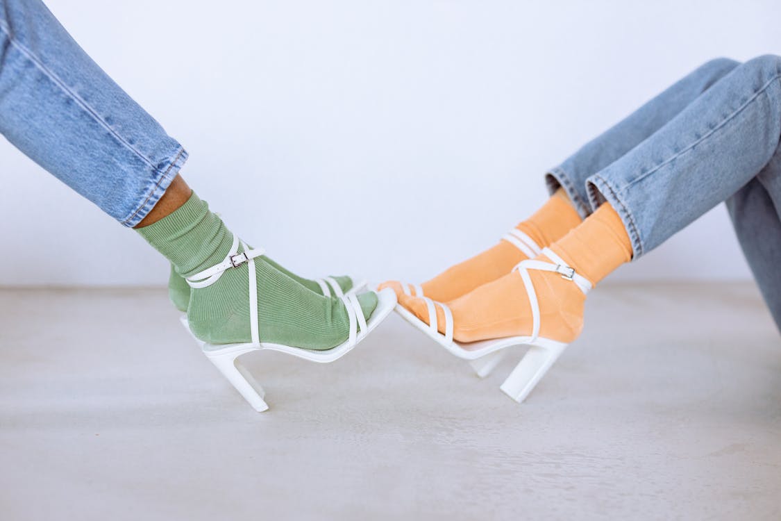 Free Close-up of People Wearing Socks with Heels Stock Photo