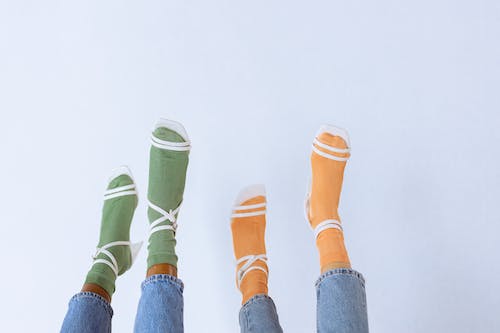 Free Close-up of People Wearing Socks with Heels Stock Photo
