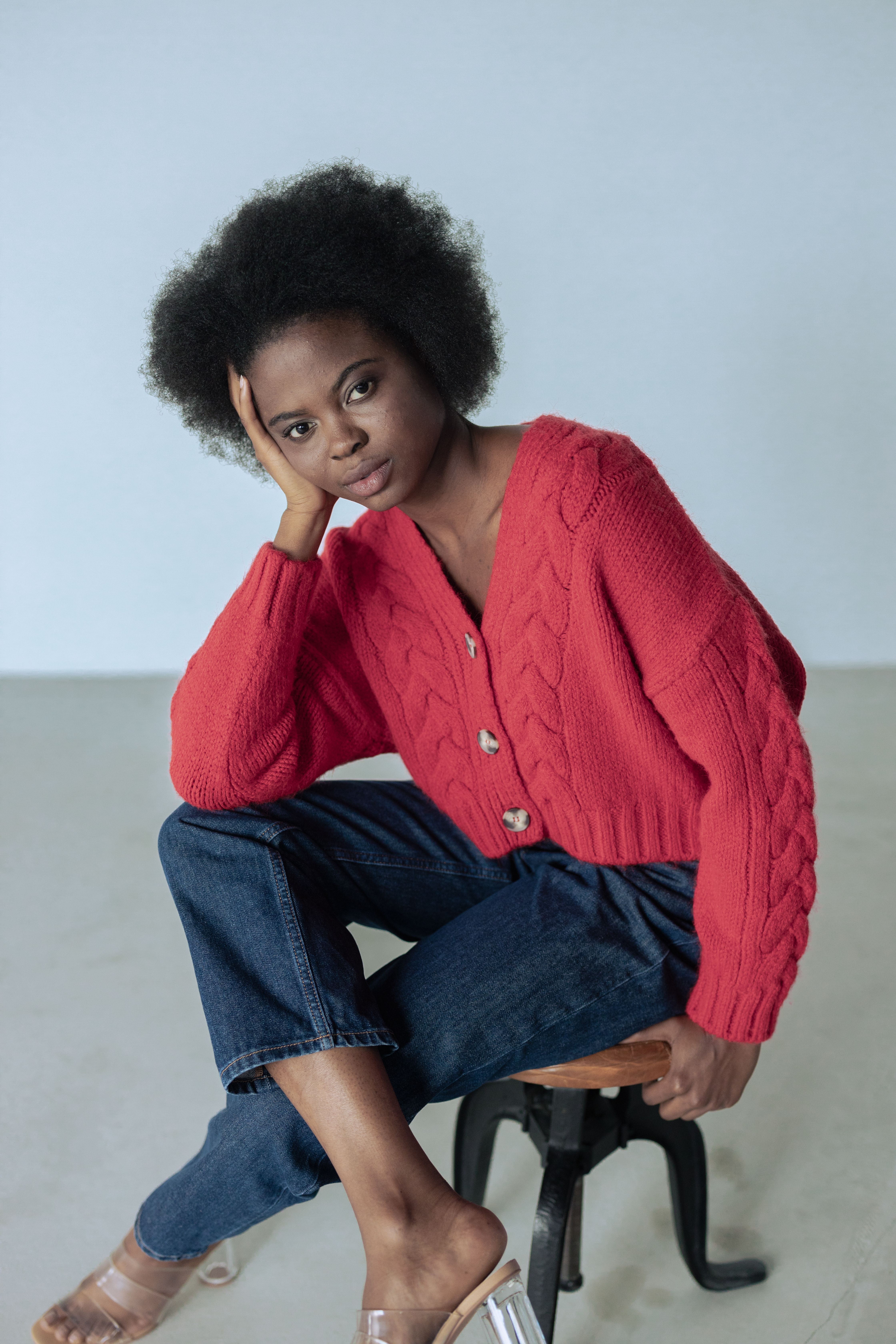 Woman in jeans with soft knit cardigan