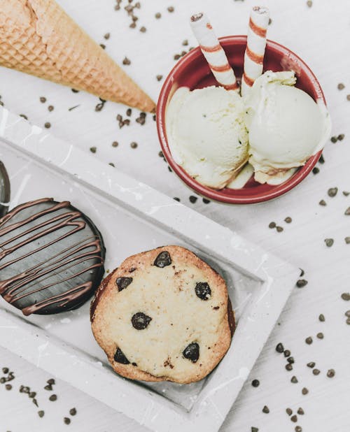 Overhead Shot of Ice Cream Near a Muffin