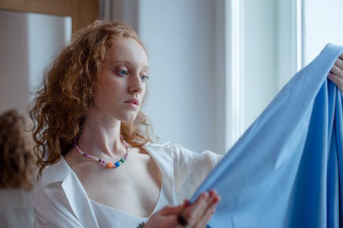 A Woman in White V Neck Shirt