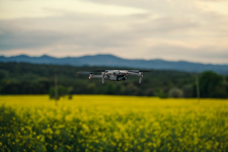 Drone Flying On A Field