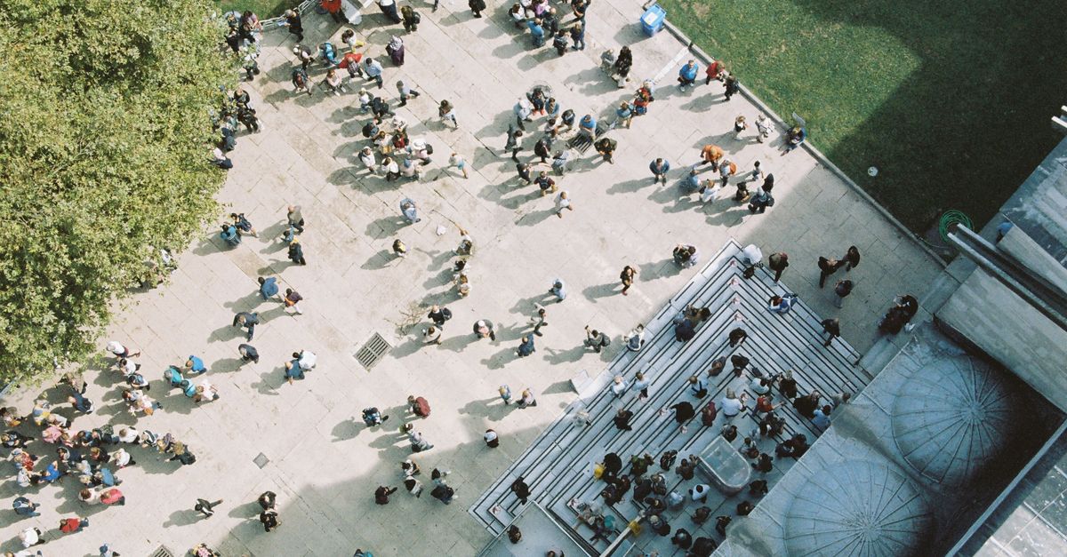 Aerial view of Christ Embassy Ho building with congregation outside