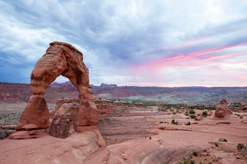 Free Breathtaking sunset view of Delicate Arch in Arches National Park, Utah. Stock Photo
