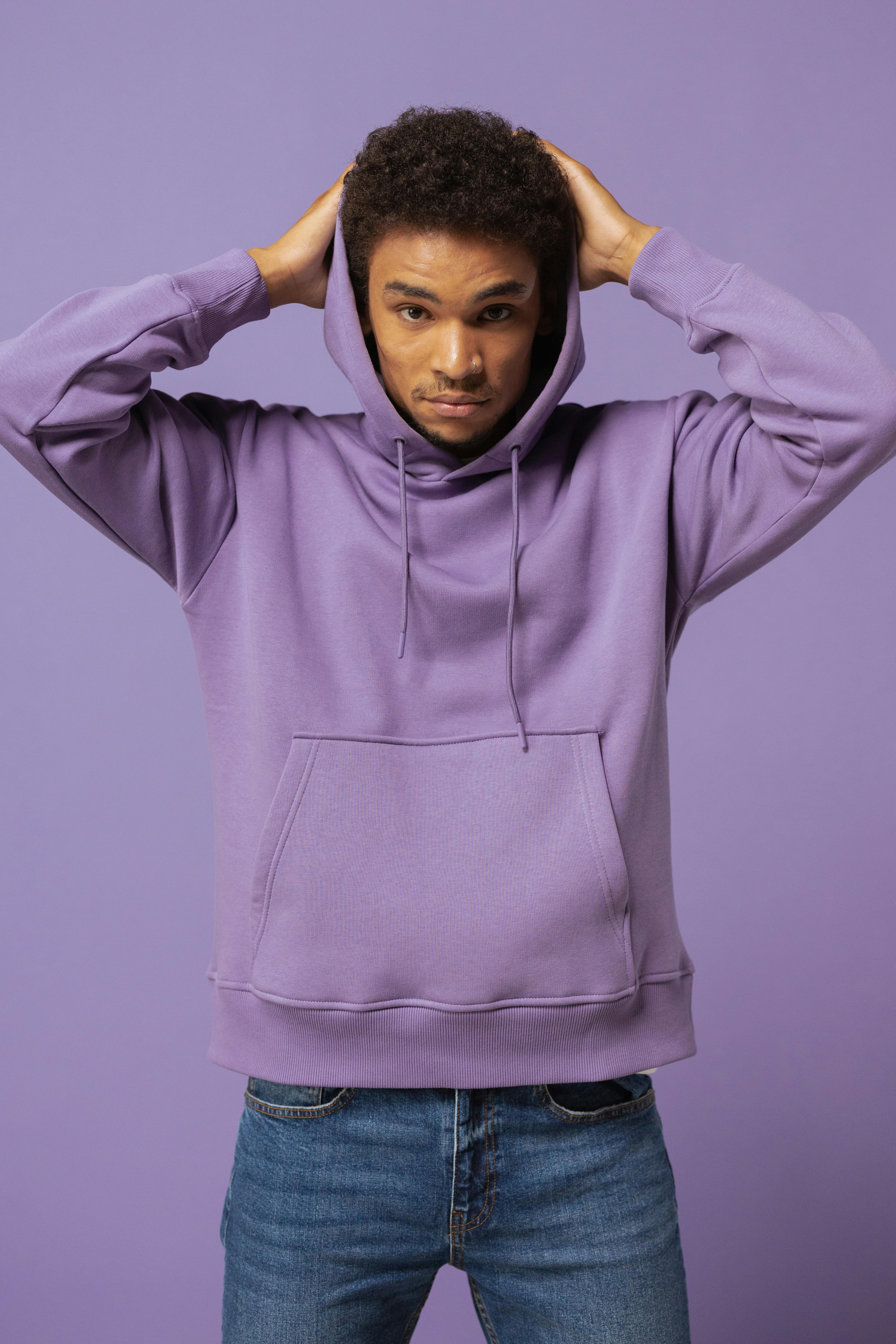 A Man Wearing a Purple Hoodie Free Stock Photo