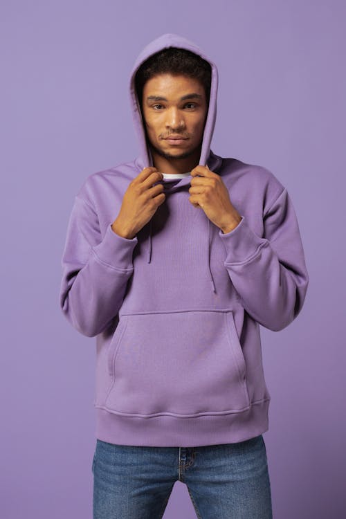 Man Wearing a Purple Hoodie Sweater