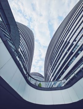 Stunning low-angle view of futuristic buildings in Chaoyang, Beijing, showcasing modern architectural design.