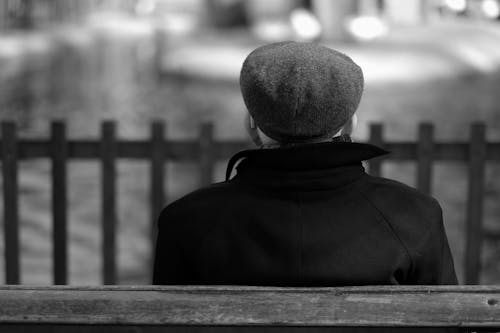 Free Grayscale Photo of Person Wearing a Beret Stock Photo