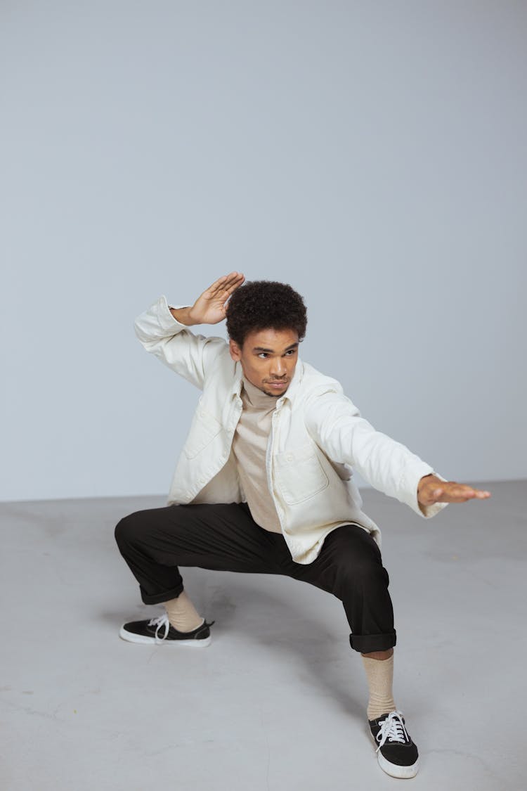 Man In White Dress Shirt And Black Pants