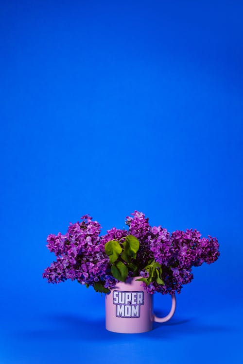 A Pink Mug with Lilac Flowers