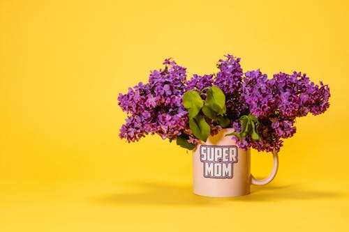 A Pink Mug with Lilac Flowers