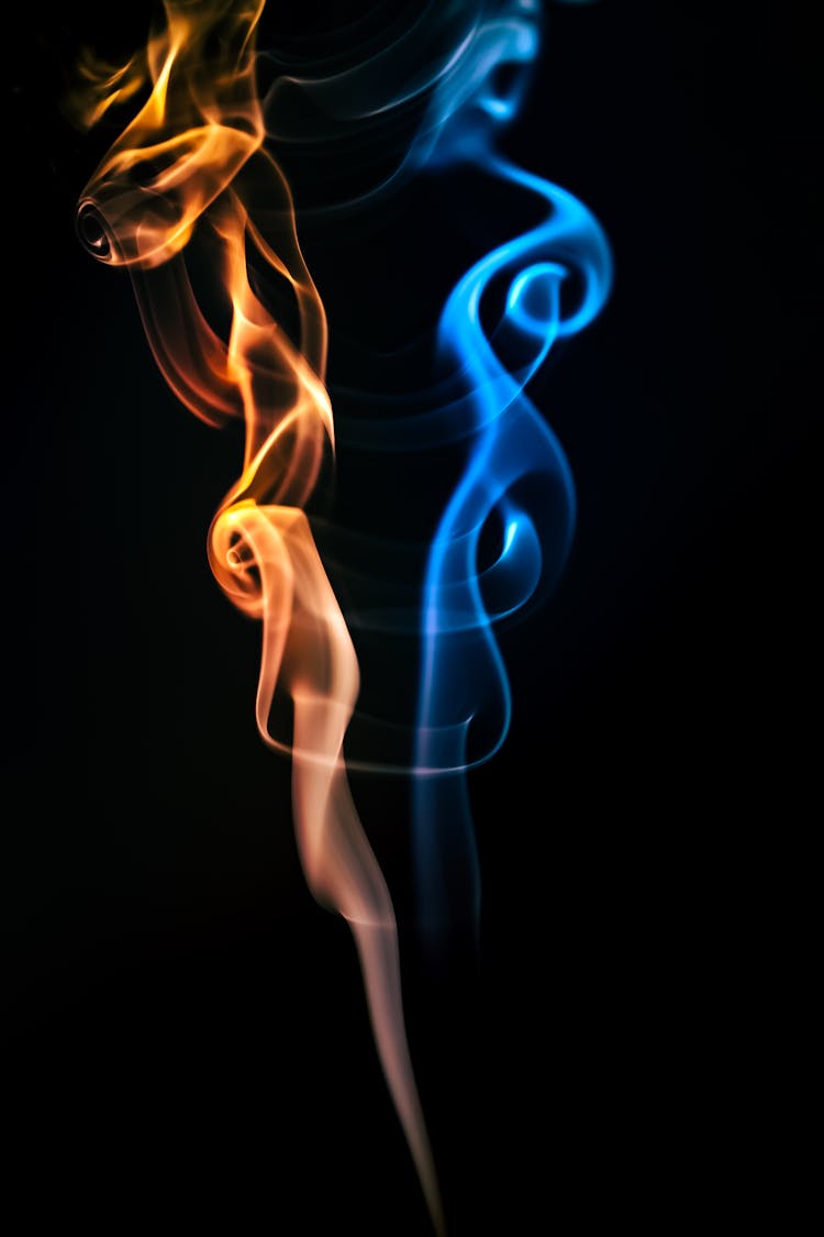 Colorful Smoke In Black Background