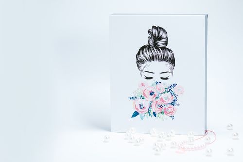 Free Elegant illustration of a woman with flowers and pearls on a white background. Stock Photo