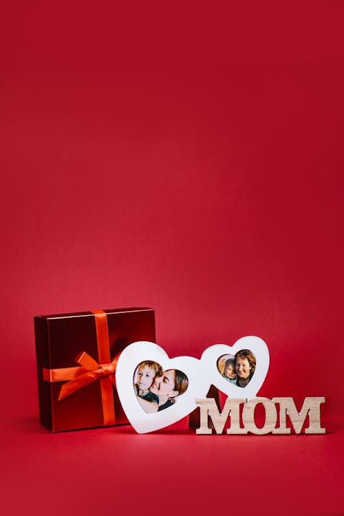 Free Heart Shape Photo Frame and a Red Gift Box Stock Photo