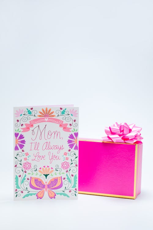 Pink Ribbon on a Gift Box and a Greeting Card