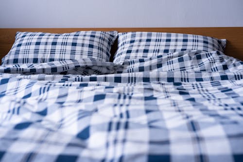 Free White and Blue Checkered Bedsheet Stock Photo