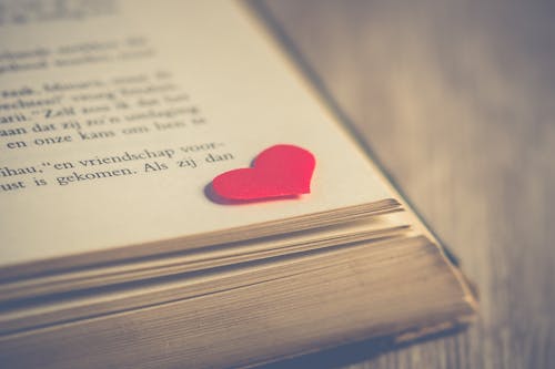 Free Photography of Red Heart on Book Page Stock Photo