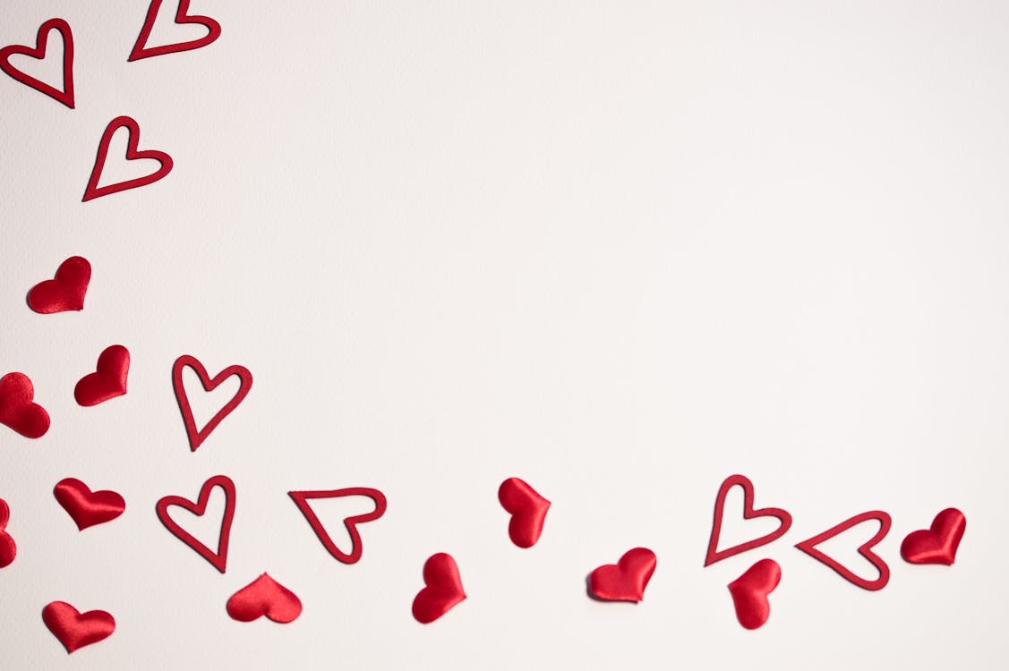 Free Mini Red Hearts Wallpaper Stock Photo