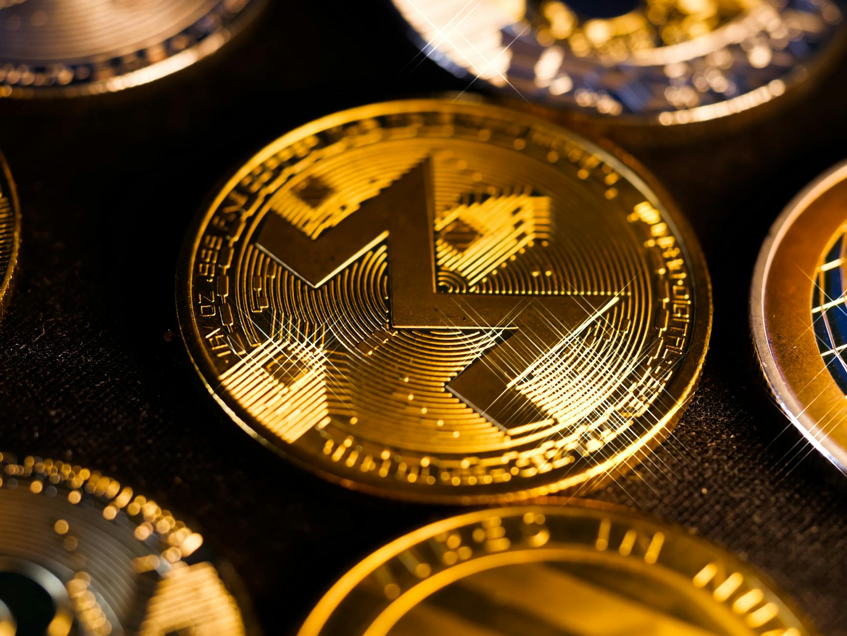 Shiny gold Monero coin close-up, focusing on digital currency aesthetics and investment potential.