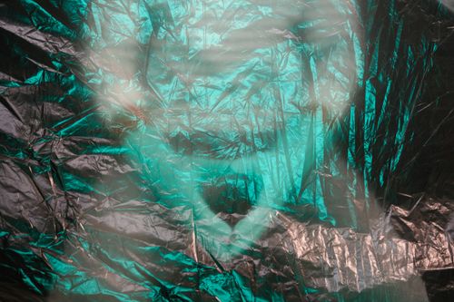 Free An abstract view of a textured surface with green and black wrinkles, creating an artistic visual. Stock Photo