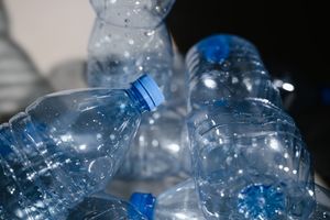Plastic bottles with water droplets — photo by MART PRODUCTION on Pexels