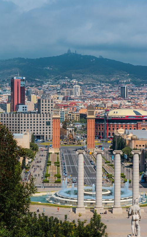 Free A stunning aerial view of Barcelona featuring the iconic Montjuïc and vibrant cityscape. Stock Photo