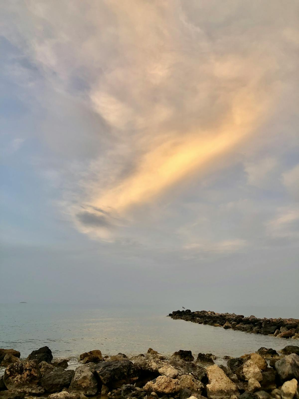 Woman wearing VR headset over a city at night