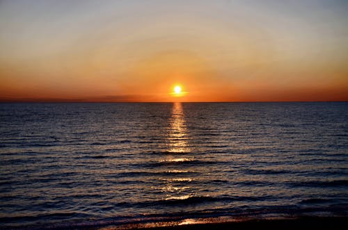 Бесплатное стоковое фото с горизонт, закат, море