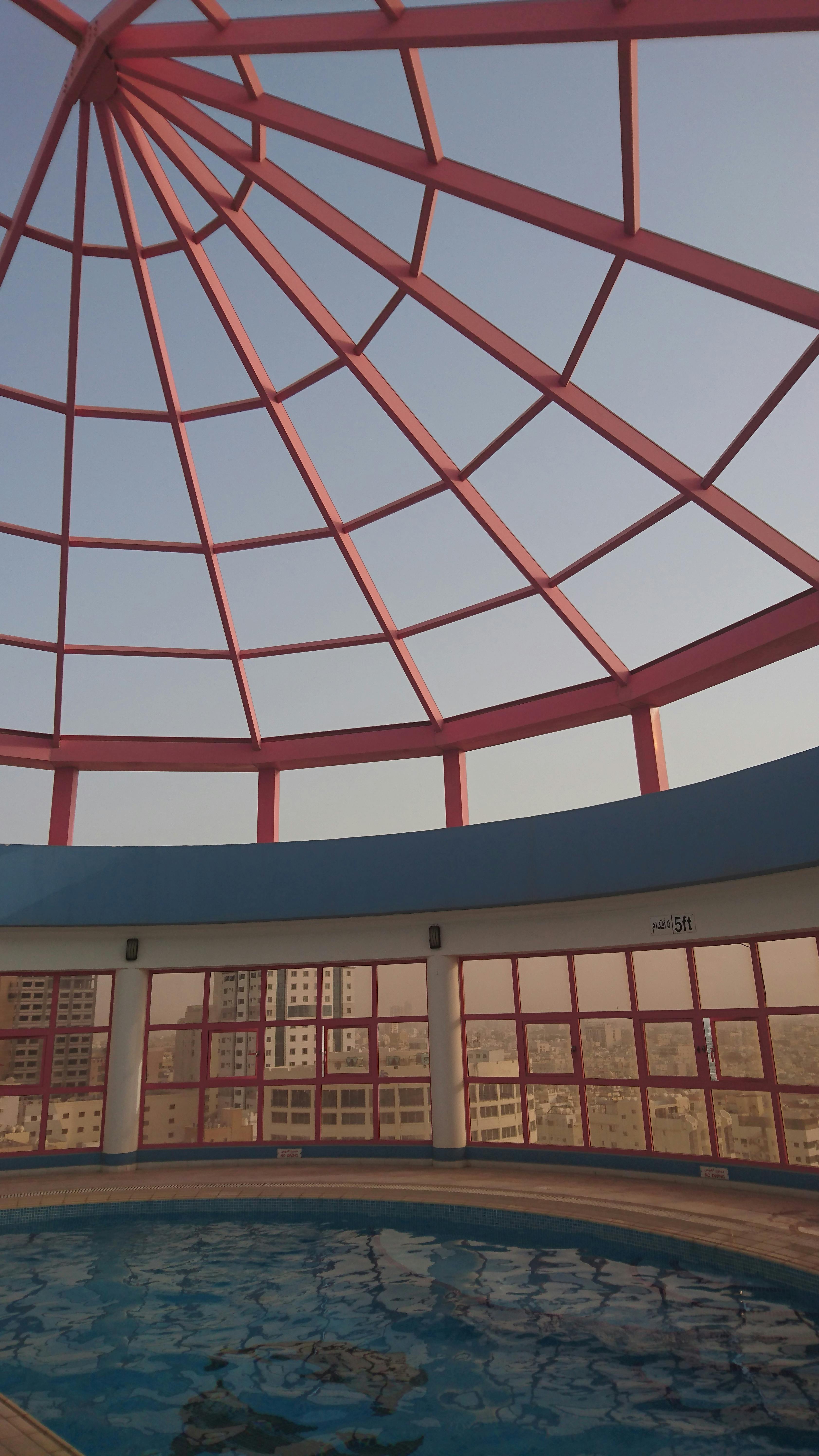 Swimming Pool with Metal Frame Ceiling · Free Stock Photo