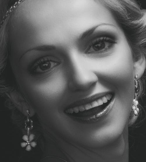 Free Smiling Woman Wearing Silver Earrings Stock Photo