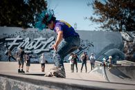 Man in Blue T-shirt and Blue Denim Jeans Riding Bicycle