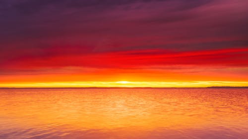 Free Orange Ocean Water during Sunset Stock Photo