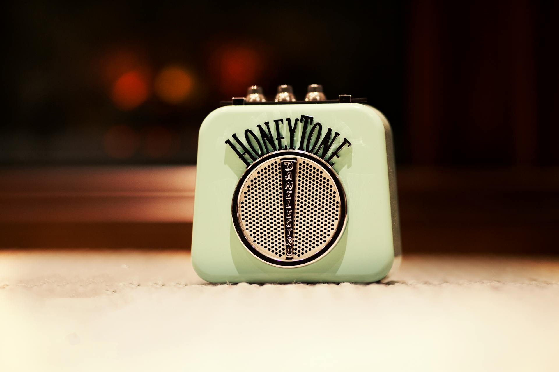 Selective Focus Photography of Honey Tone Mini Amp