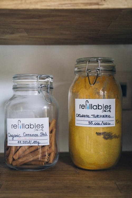 Glass Jars with Turmeric and Cinnamon Sticks