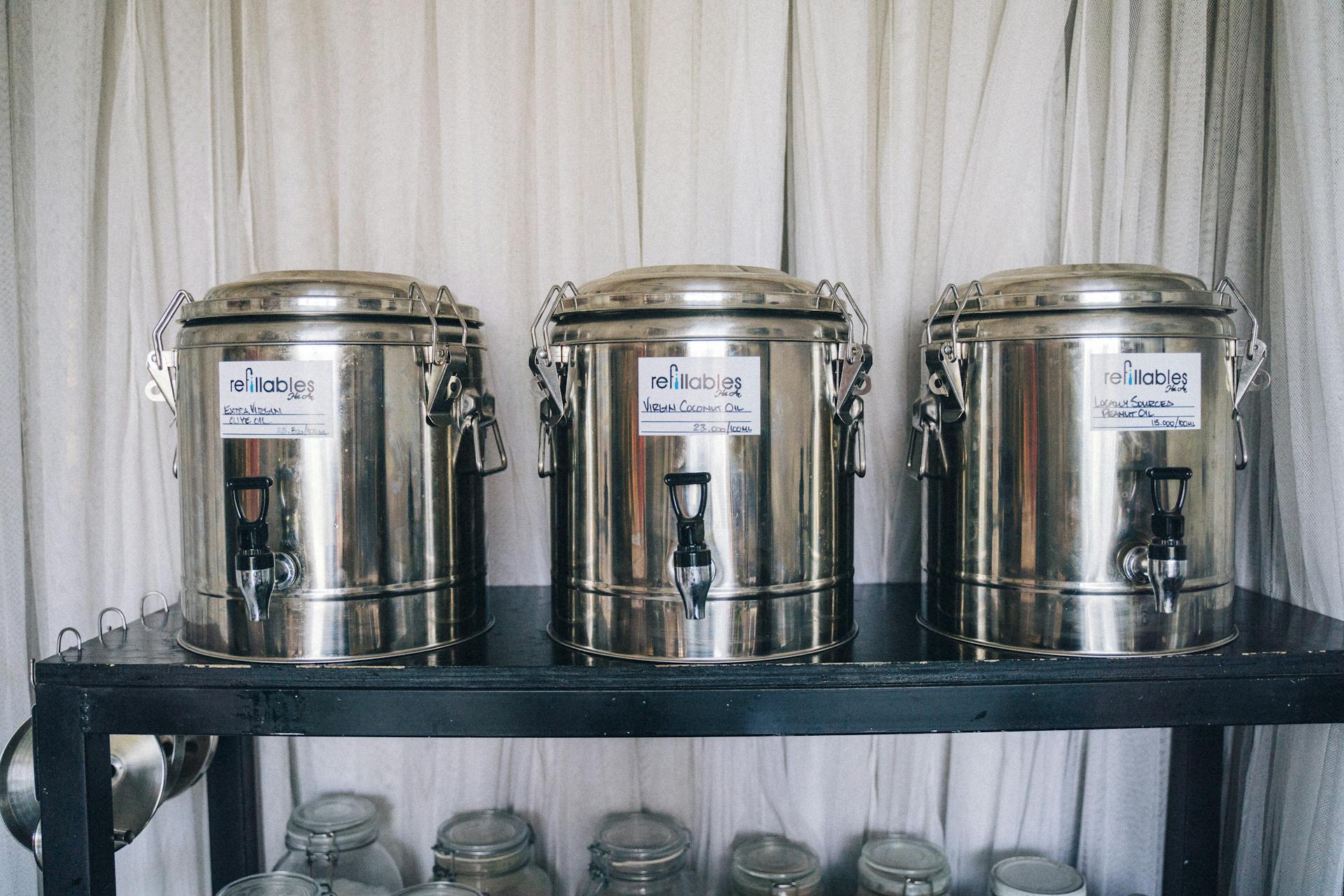 Triple set of steel containers for sustainable kitchen storage and zero waste solutions.
