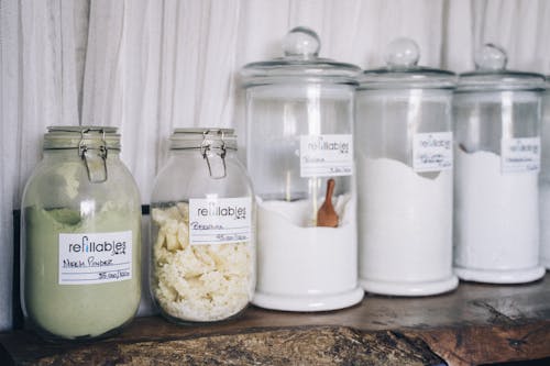 Free Assorted Powders in Glass Jars Stock Photo
