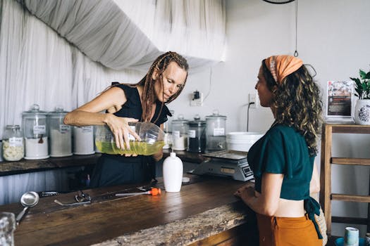 A woman refills a bottle with liquid soap at an eco-friendly retail store.