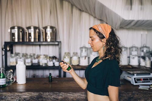 A Woman Holding a Bottle